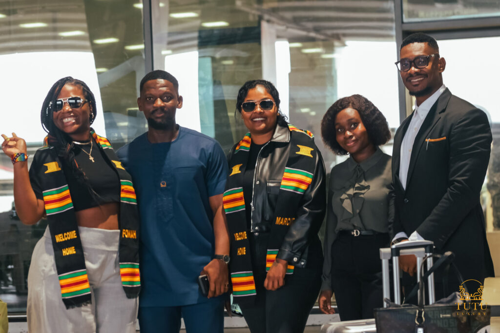 Image of returnees to Ghana and being welcomed at the airport by Chauffeur and Concierge